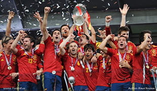 Spain celebrate with the title